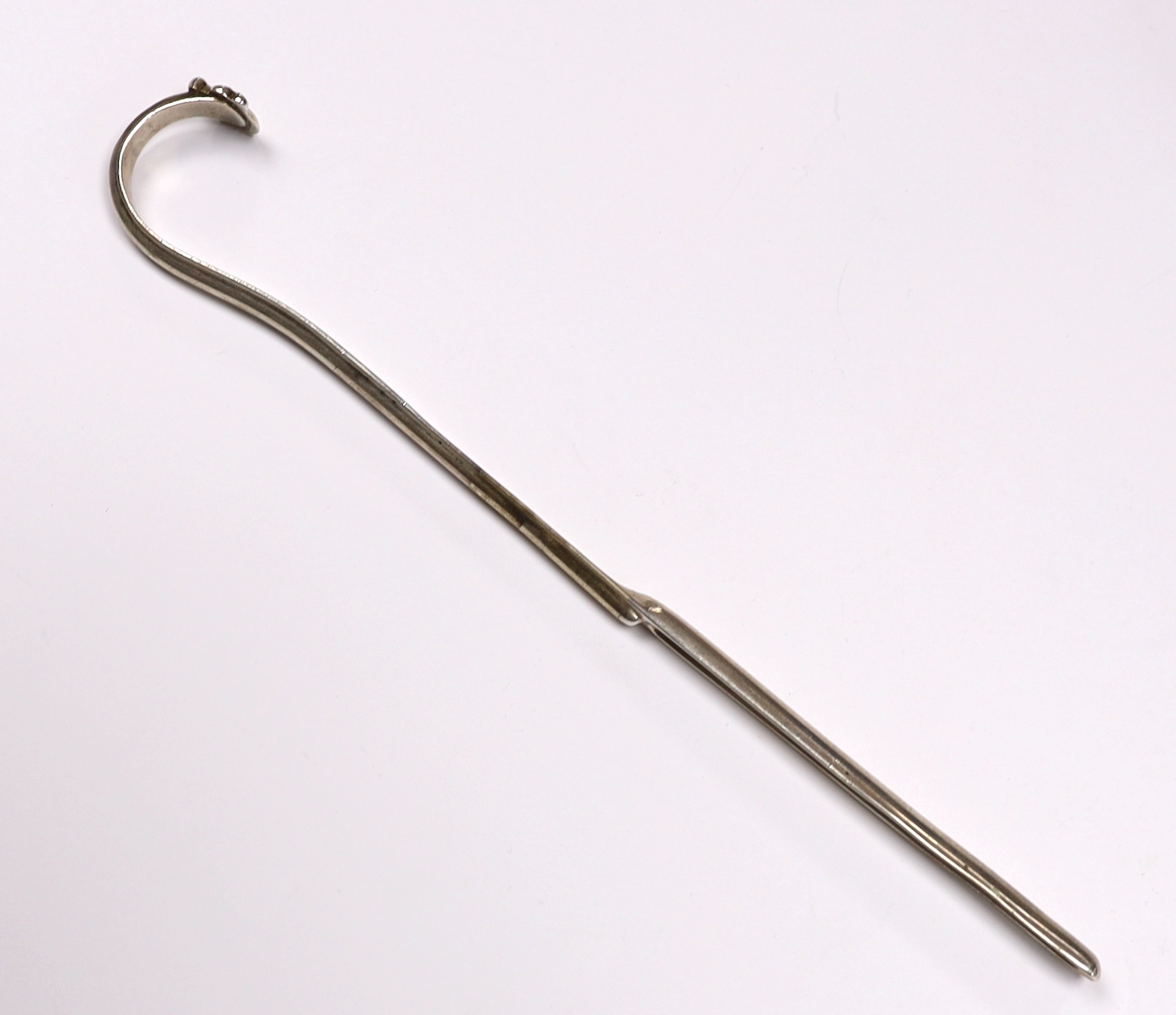 An 18th century Dutch? white metal marrow scoop, with unusual loop handle, maker BS, 22.9cm, 50 grams.